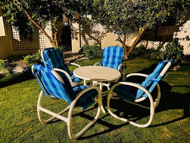 Outdoor seating area in the garden, daytime