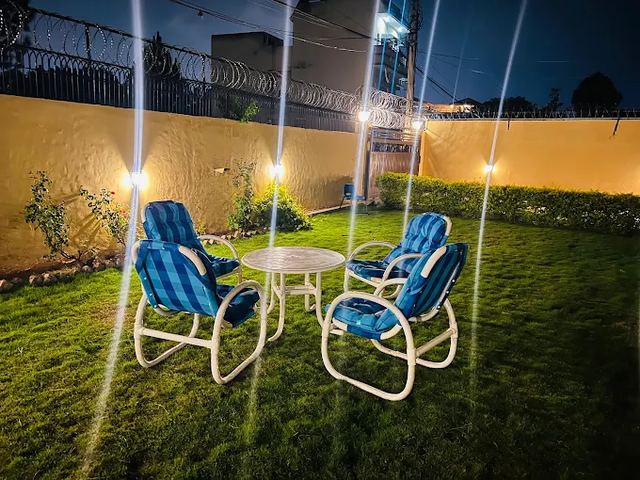 Outdoor seating area in the garden, evening